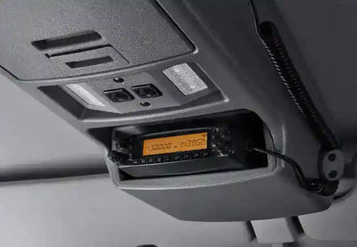 Close-up of a vehicle's Gray Roof Console with radio