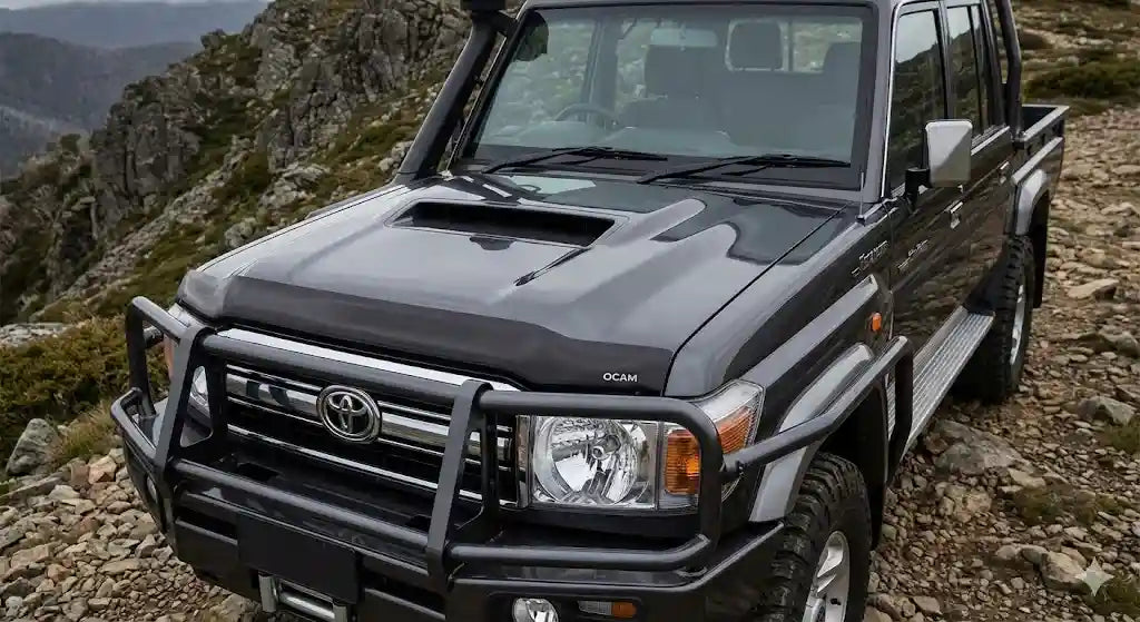 Front view of Graphite Grey Toyota LandCruiser 79 Series Double Cab (2021 Model) with OCAM Bonnet Protector installed.