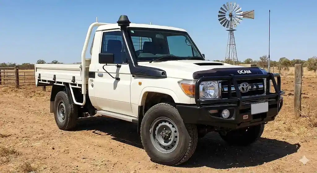 Front view of French Vanilla White Toyota LandCruiser 79 Series Single Cab (2012 Model) with OCAM Bonnet Protector installed.