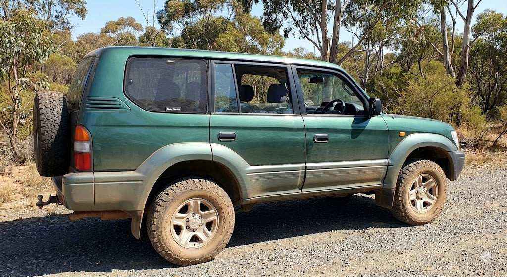 Snap Shades magnetic window shade installed on Toyota Prado 95 Series rear door