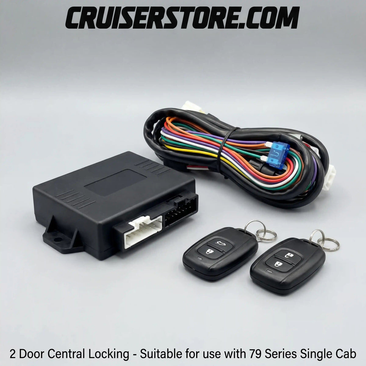2 door central locking kit with control box, key fobs and wiring harness for LandCruiser 79 Series single cab on a white background