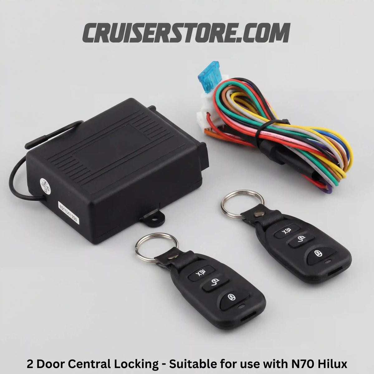 2 door central locking kit with control box, key fobs and wiring harness for Toyota Hilux N70 on a white background