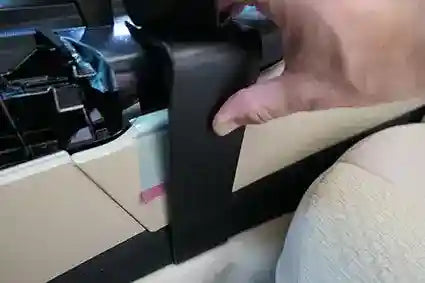 Hand installing ClicOn Dash Mount 