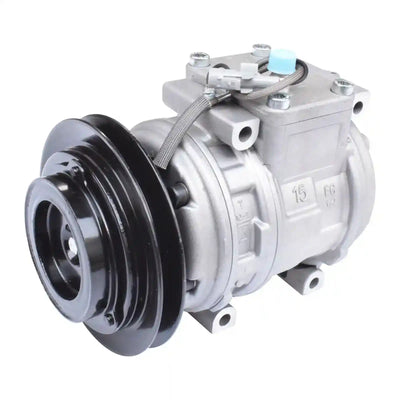 Automotive air conditioning compressor on a white background