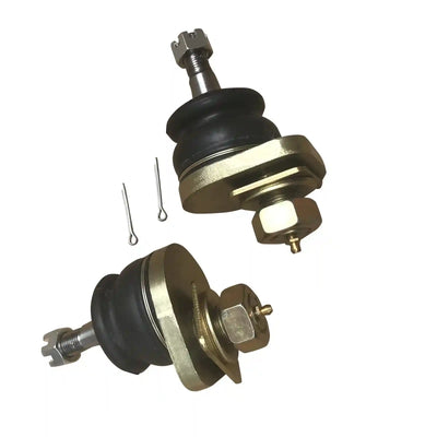 Two metal ball joints with black rubber boots on a white background