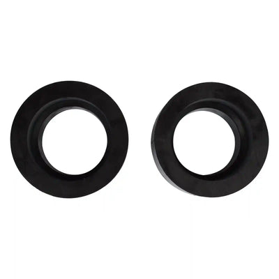 Two black front coil spring spacers