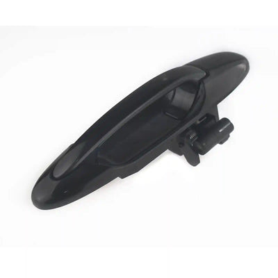 Black car door handle on a white background