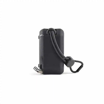Black keychain device with a strap on a white background