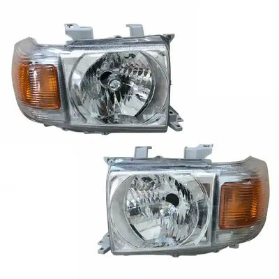 Pair of car headlights on a white background