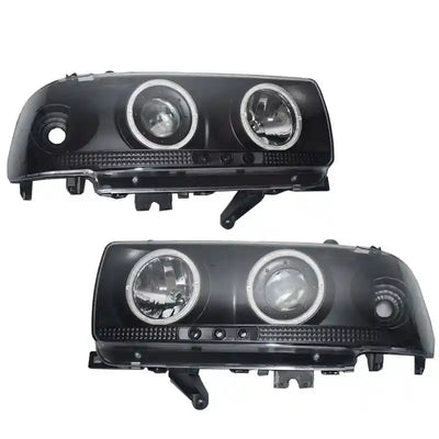 Pair of black Angel Eye Head Lights on a white background