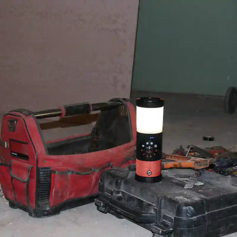 Lantern on a toolbox with a red tool chest in the background