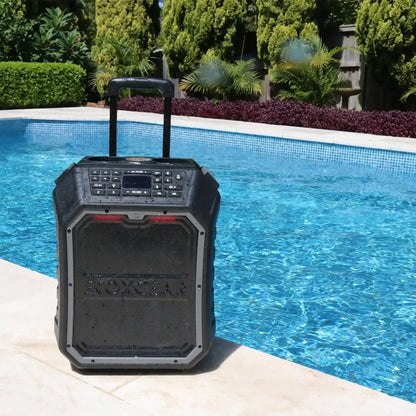 Portable outdoor speaker with a handle by a poolside