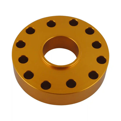 Gold metal flange with multiple holes on a white background