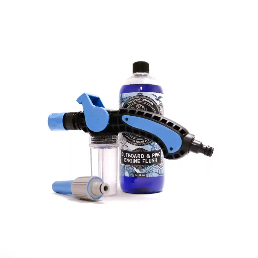 Blue and black engine flush system with a bottle on a white background