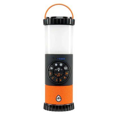 Orange and black portable lantern with speaker on a white background