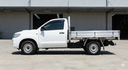 Side profile of White Toyota Hilux N70 Single Cab with OCAM weather shield on driver door.