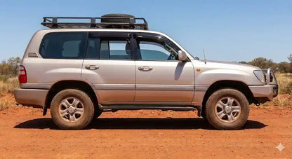 Side view of Champagne Gold Toyota LandCruiser 100 Series GXL with OCAM weather shields installed.
